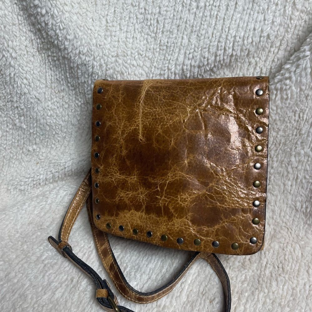 Patricia Nash Gold & bronze tooled Leather Studded crossbody Bag.